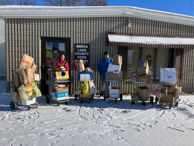 Ambassadors outside the Green Lake County Food Pantry with 841.5 pounds of food.